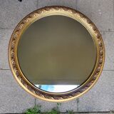 Large round mirror in Spanish gilded carved wood