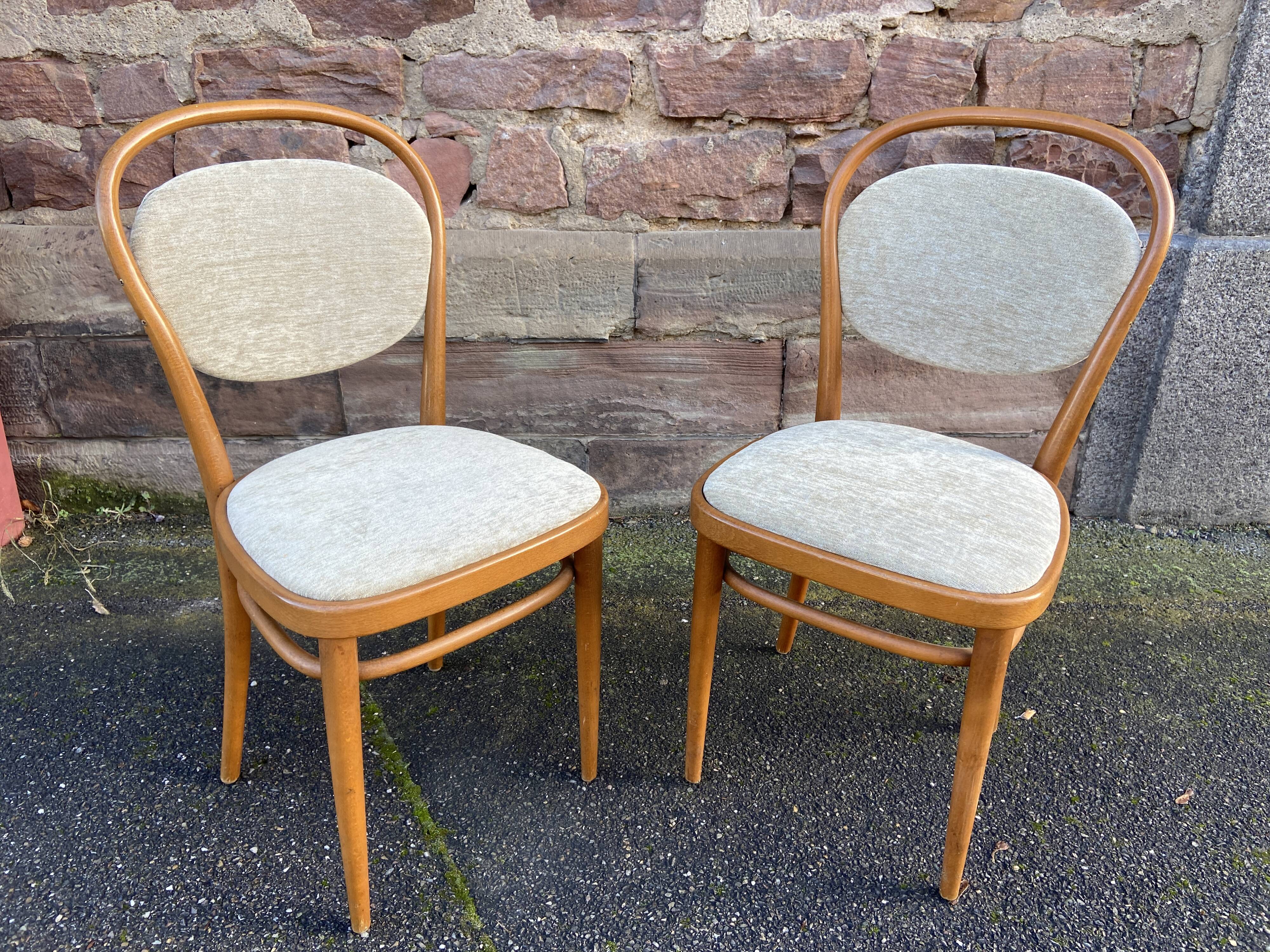 Pair of vintage curved wooden chairs