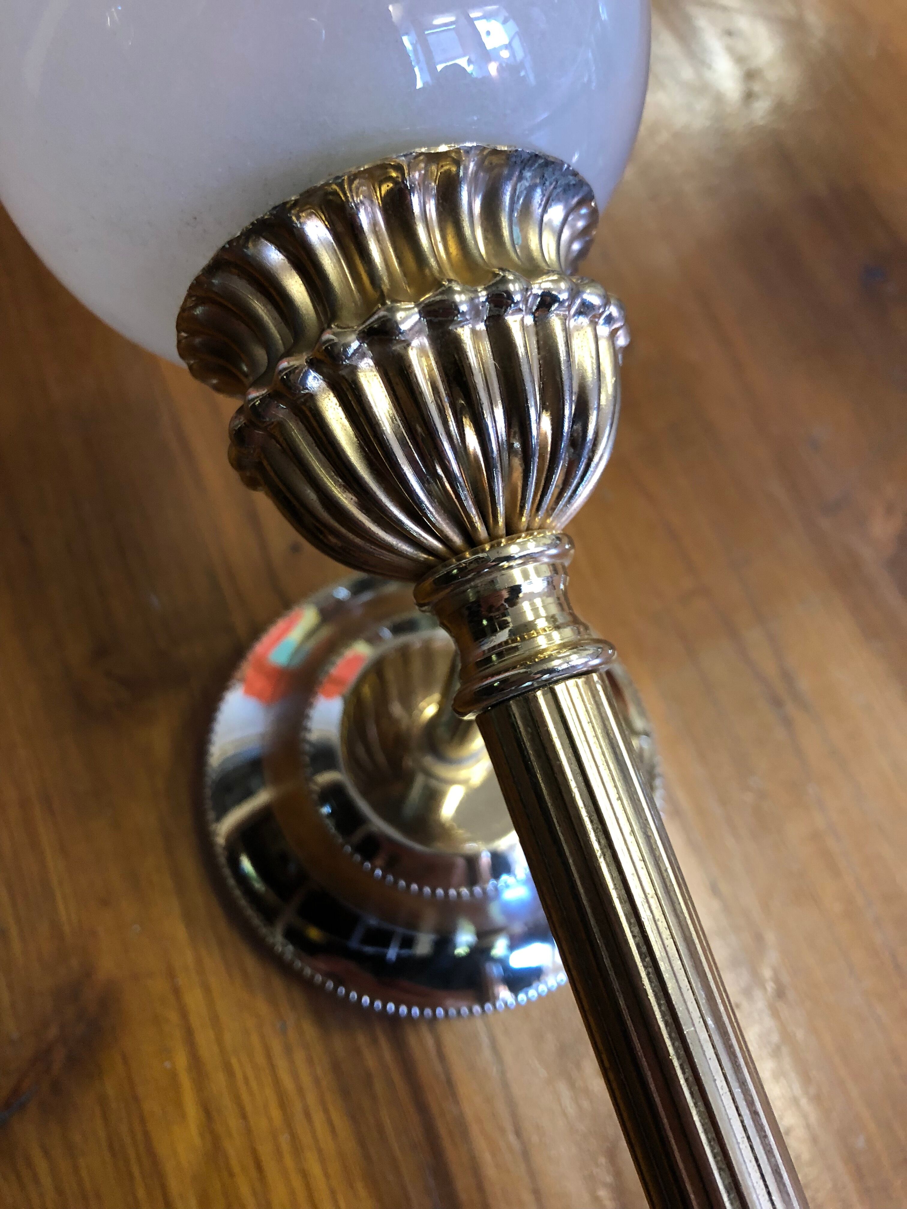 Pair of brass and opaline wall lamps