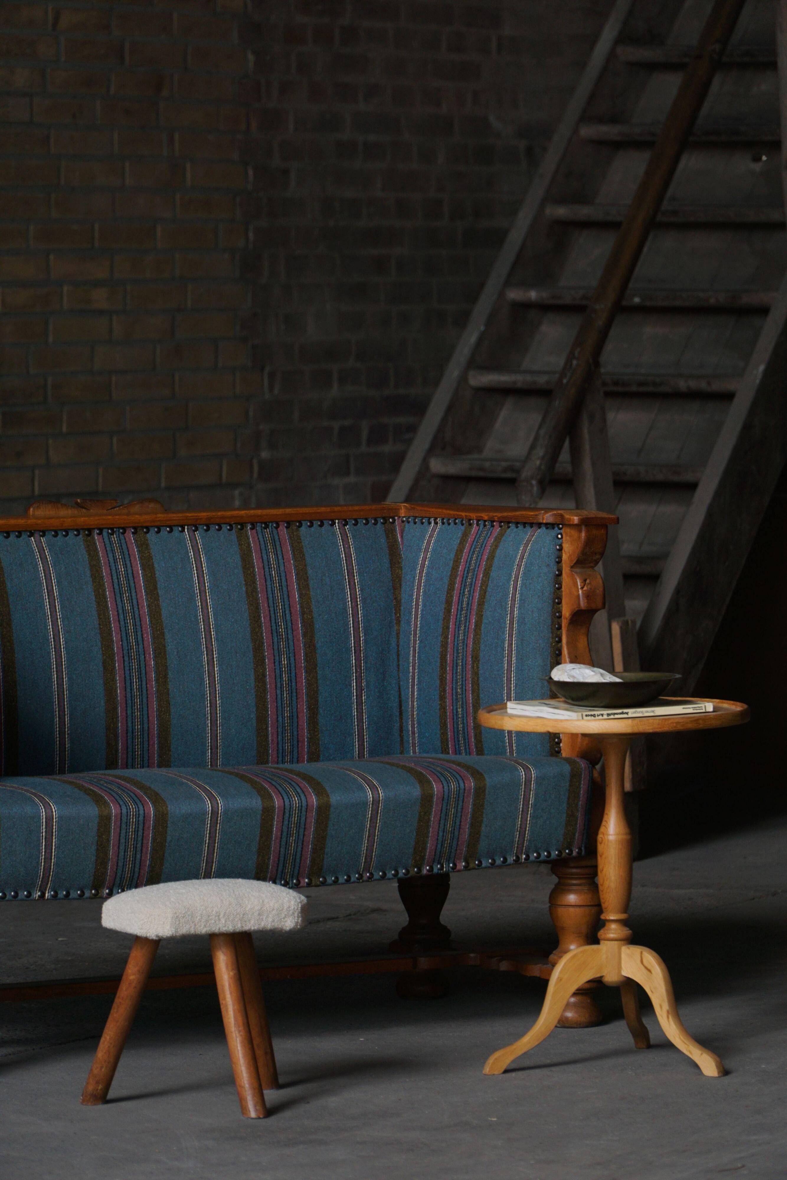 Oak canapé adorned with original upholstery, Nordic classicism, Sweden, 1930s.