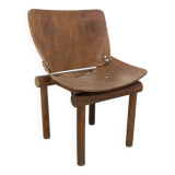 Atypical 1960s curved wood children's chair