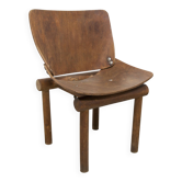 Atypical 1960s curved wood children's chair