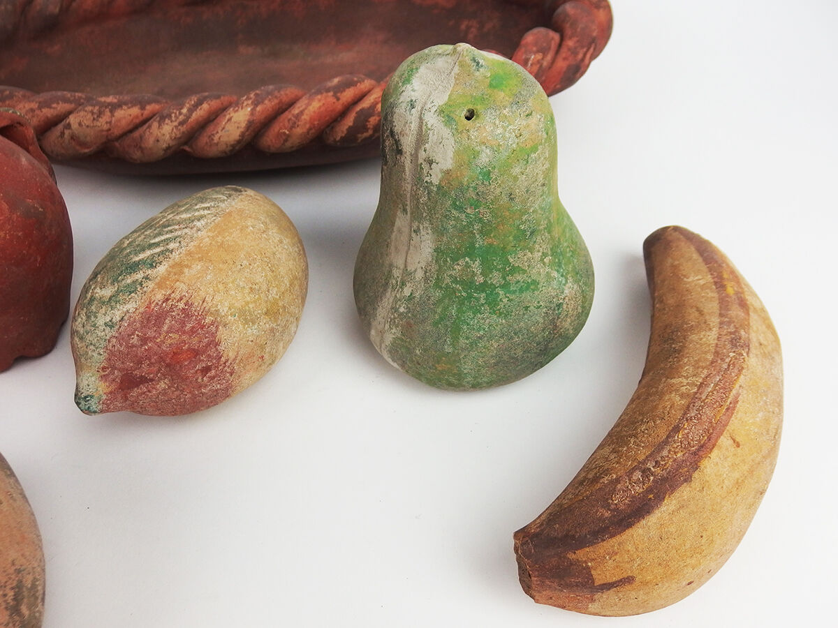 Basket and terracotta fruit