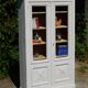 Magnificent old library/display cabinet in fir - white chalk patina.
