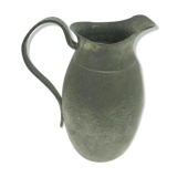Art deco pitcher in hammered tin and signed E.H. Derbesy
