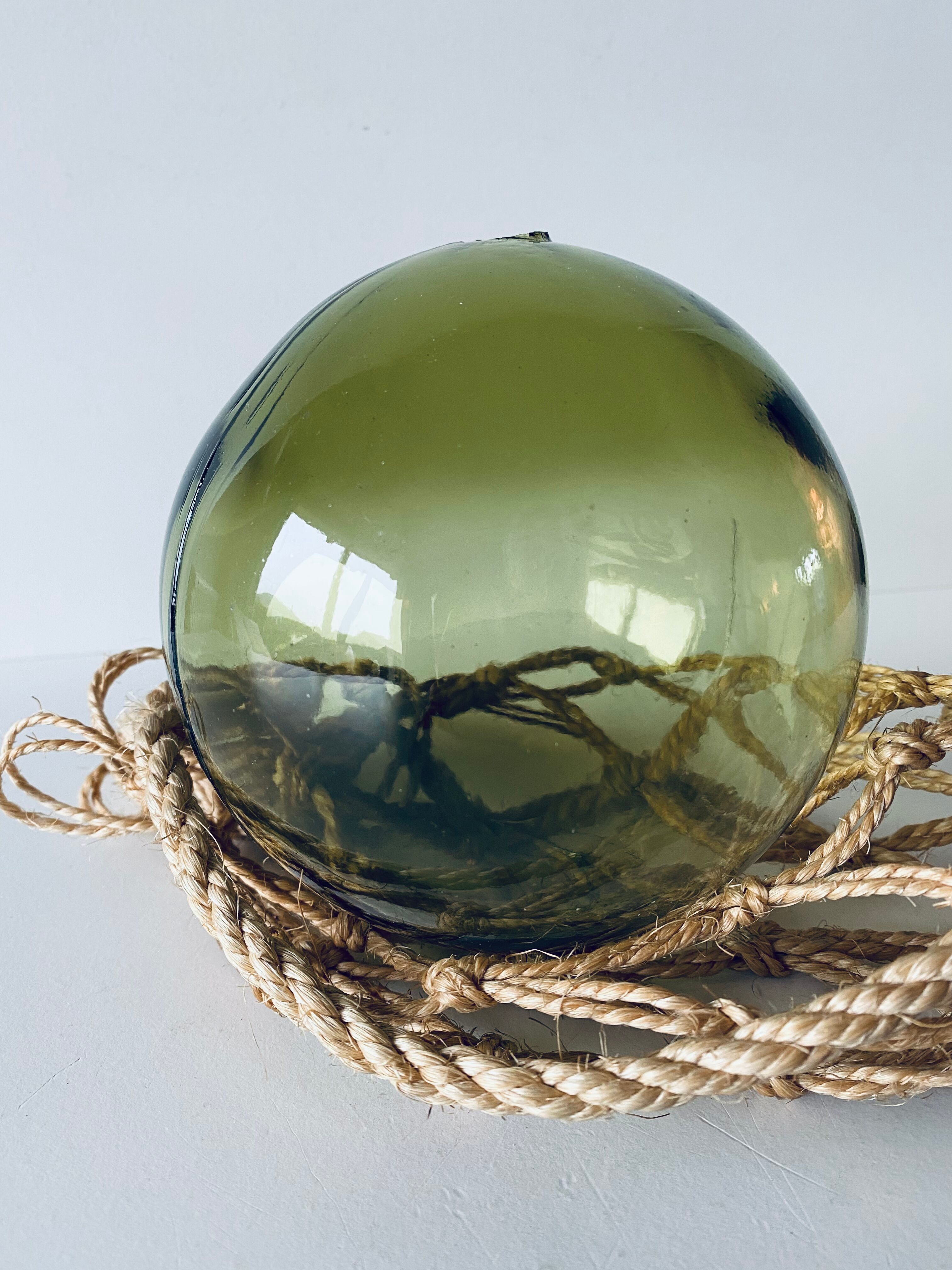 Old glass fishing float