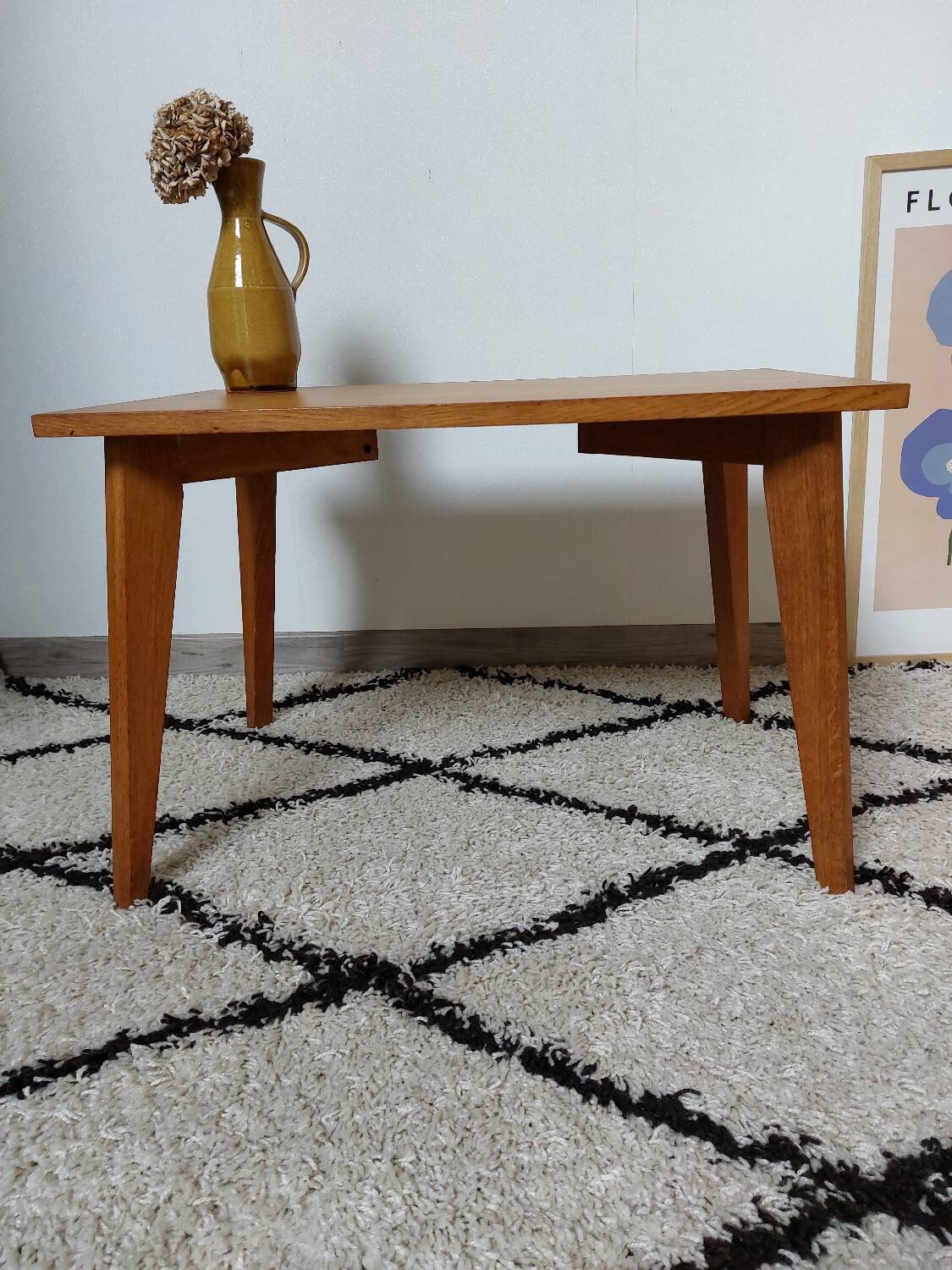 Coffee table with wooden compass legs