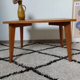 Coffee table with wooden compass legs
