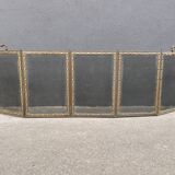 Antique fireplace screen in copper and brass from the 19th century.