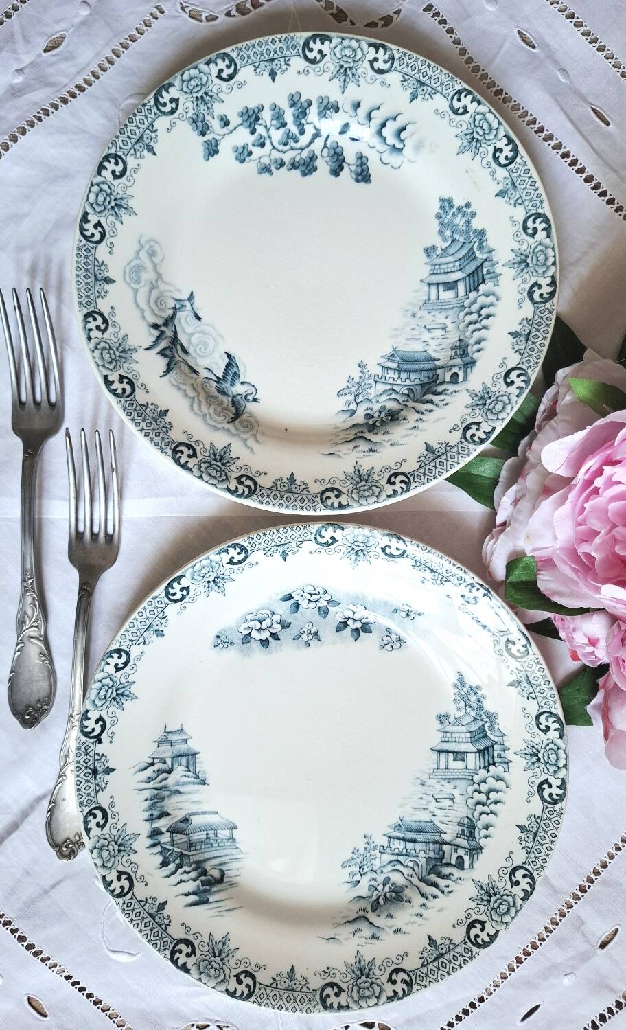 Mismatched antique flat plates made of ironstone accompanied by