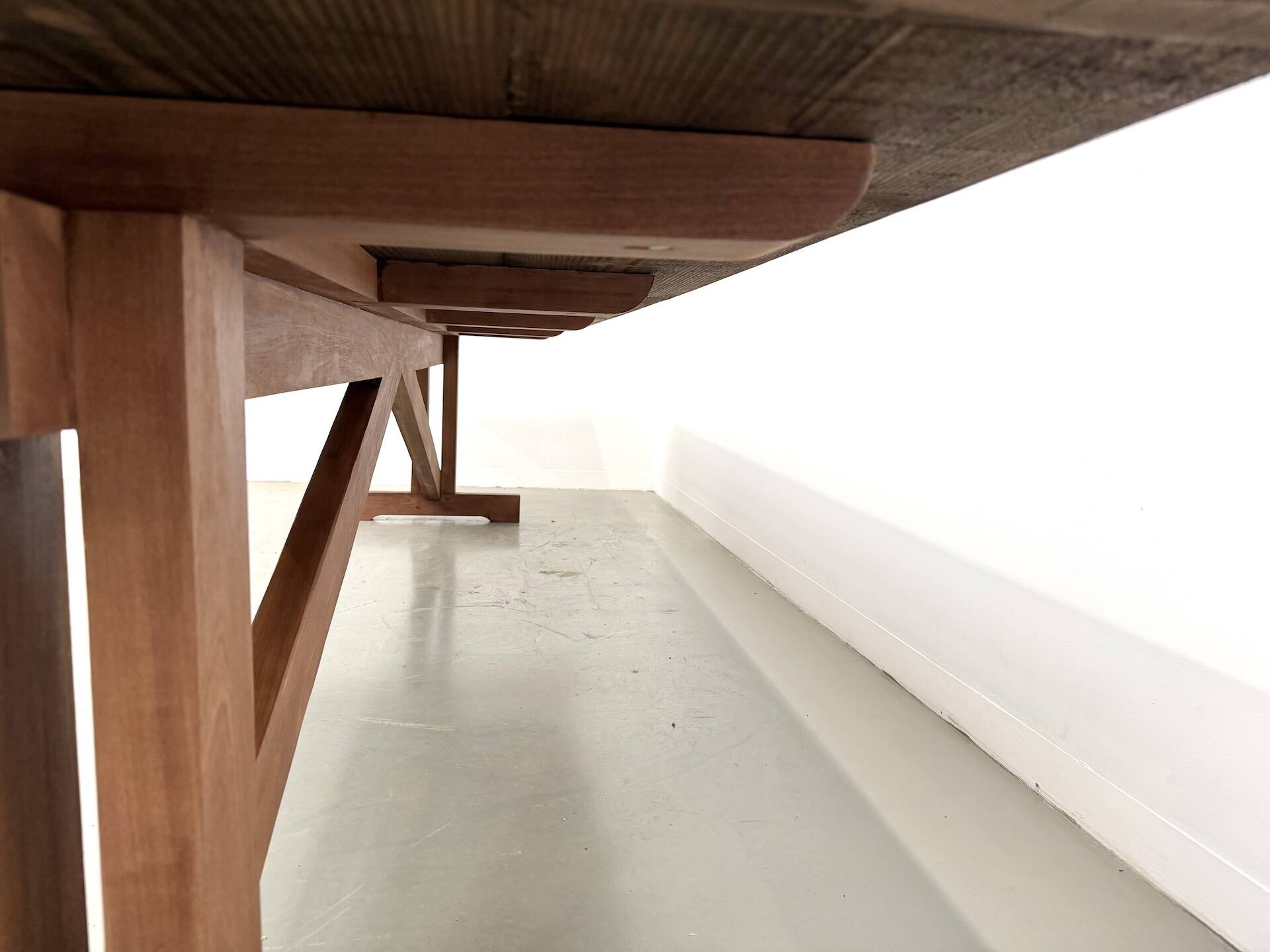 Large refectory table in solid pine and beech, with an X-shaped base.