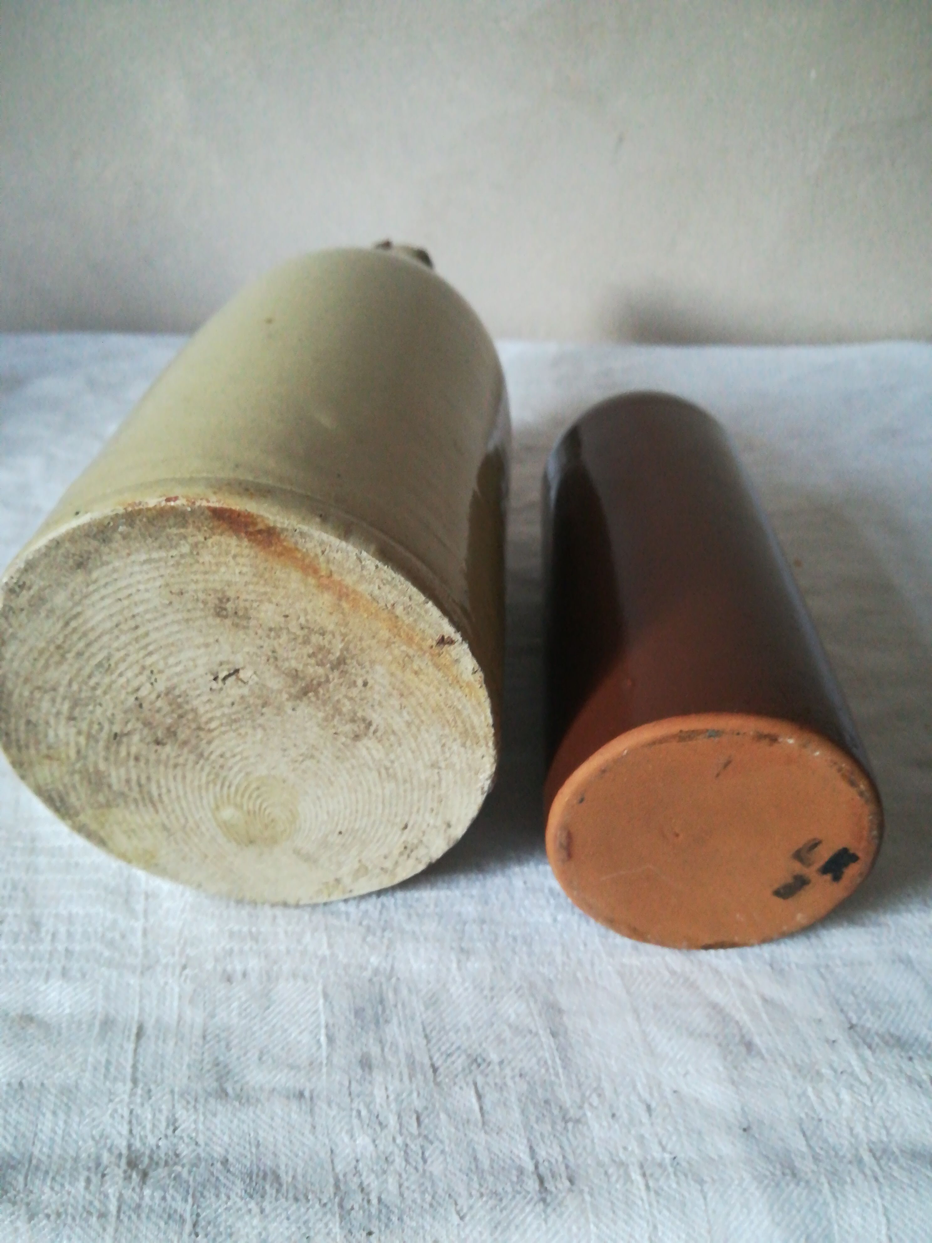 2 sandstone bottles