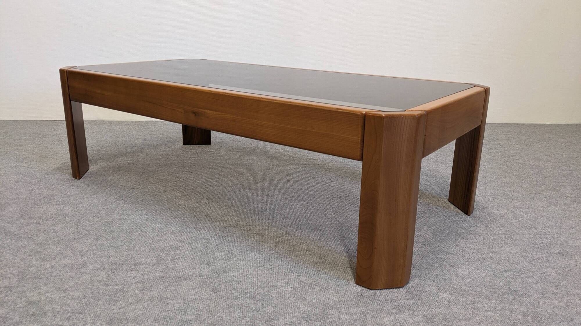 Modernist coffee table in elm and smoked glass, Italy circa 1970.