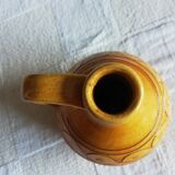 Glazed ocher round pitcher with handle