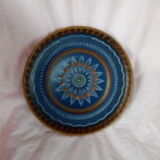 Plate in painted sandstone