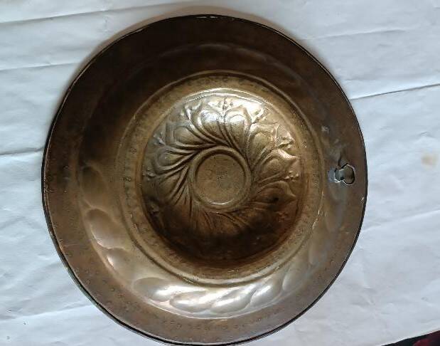 Antique brass alms dish, 17th century