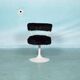 Space age design armchair from the sixties, fluffy stool with trumpet base.