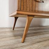 1950s chest of drawers covered in walnut with brass handles