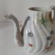 coffee pot, cup and saucers