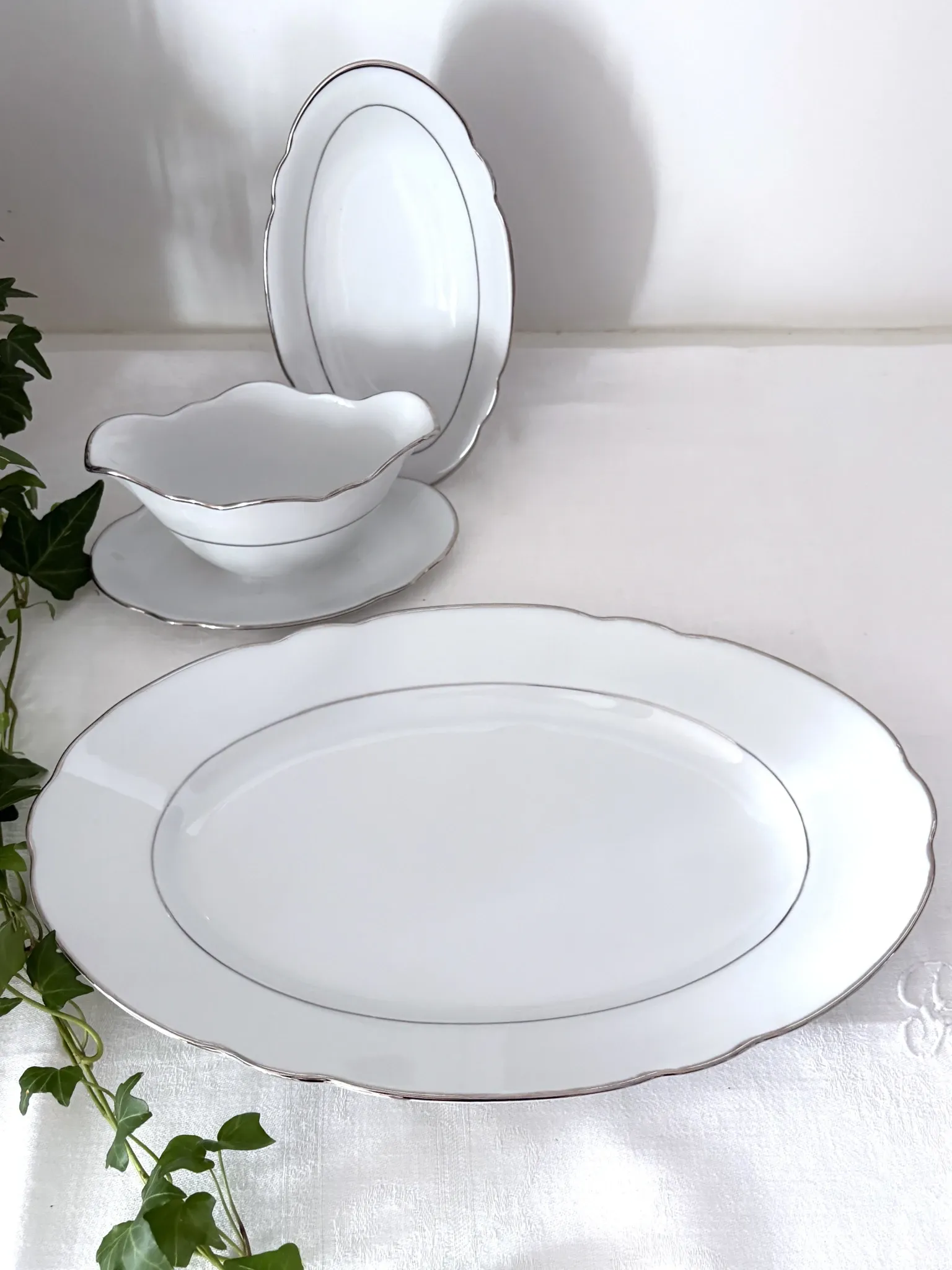 3 white porcelain plates