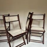 Set de quatre chaises pliantes en bois et cannage