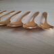 Small golden metal spoons
