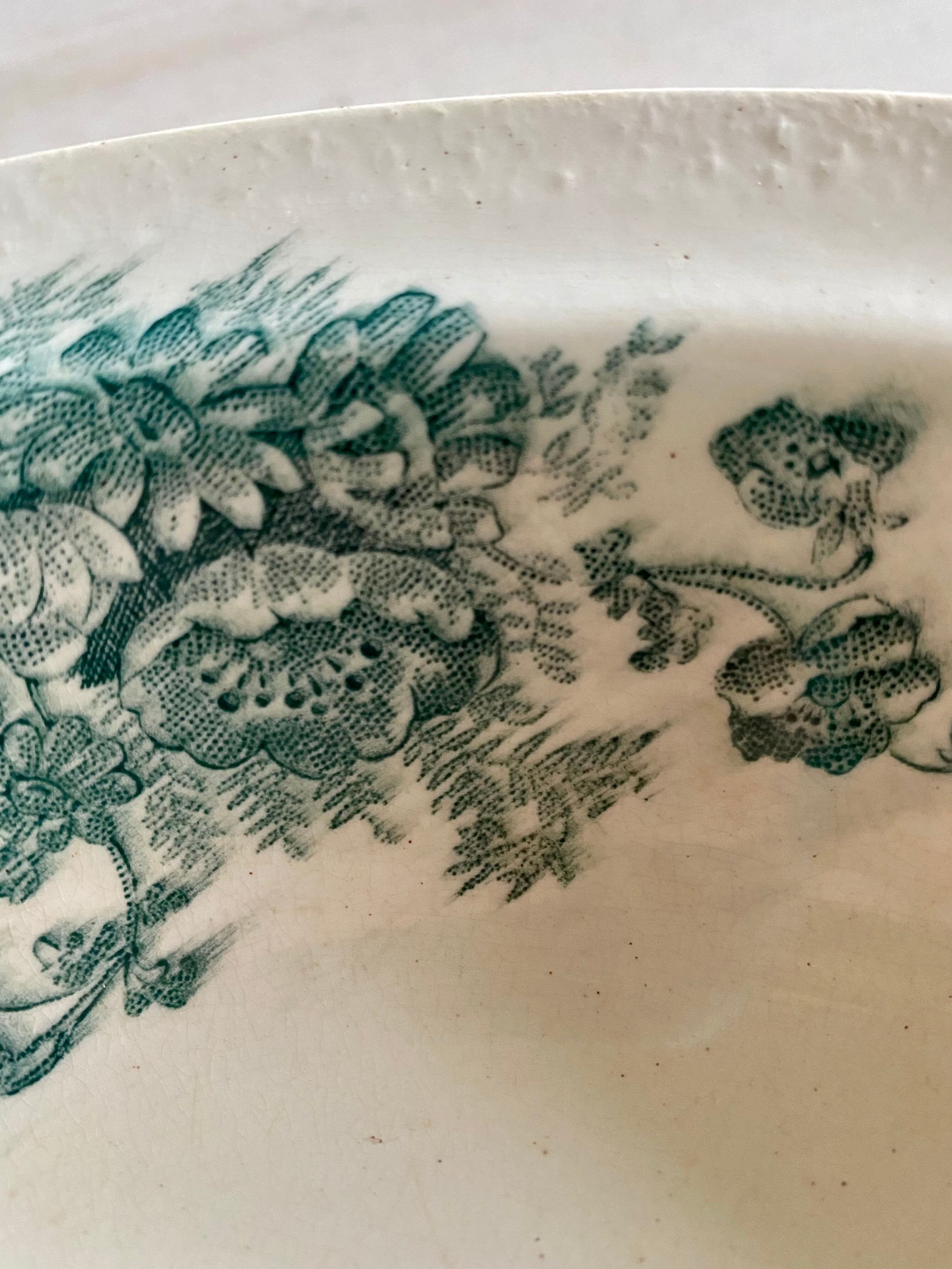 Round dish signed Bertrand Bordeaux model Anémone