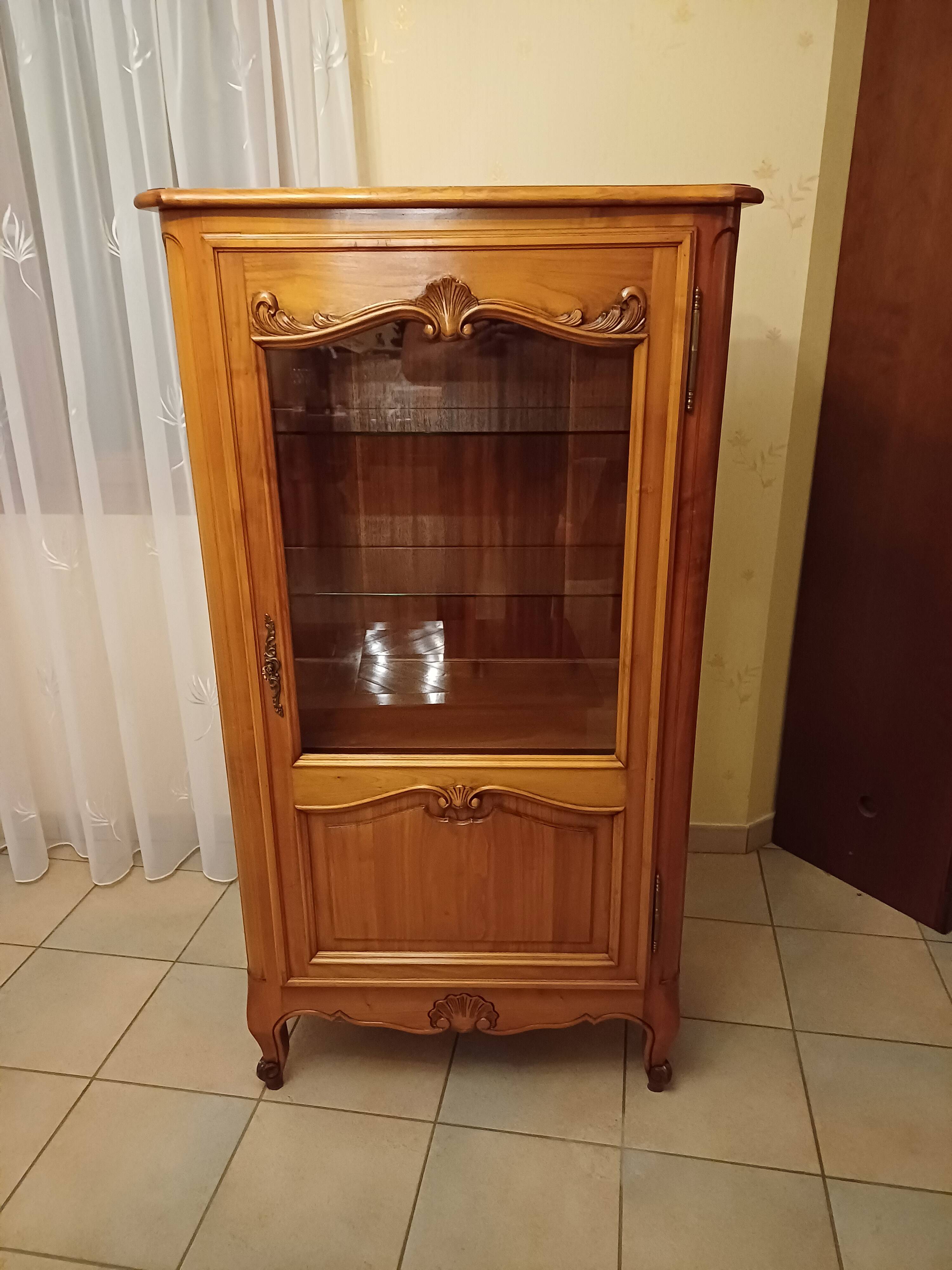 Solid wood display cabinet.