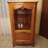Solid wood display cabinet.