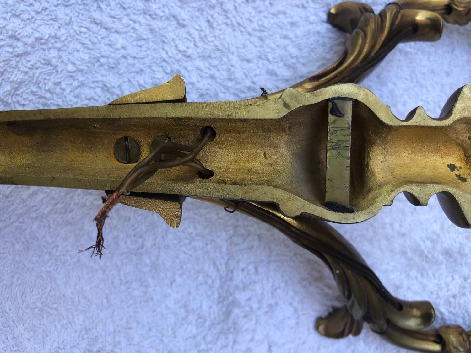 Pair of Louis XVI style bronze wall lights