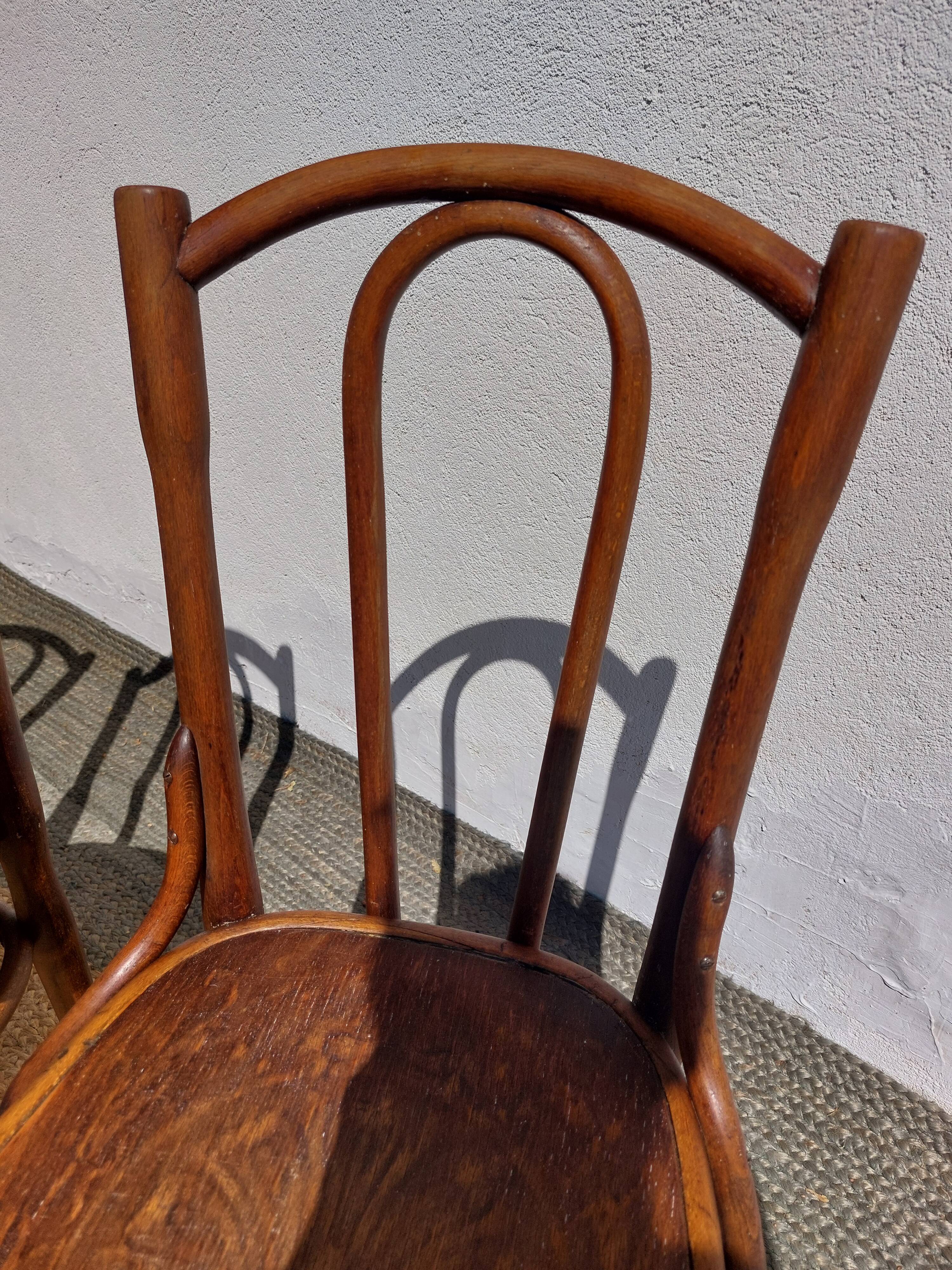 set of 3 curved wooden bistro chairs with patterns