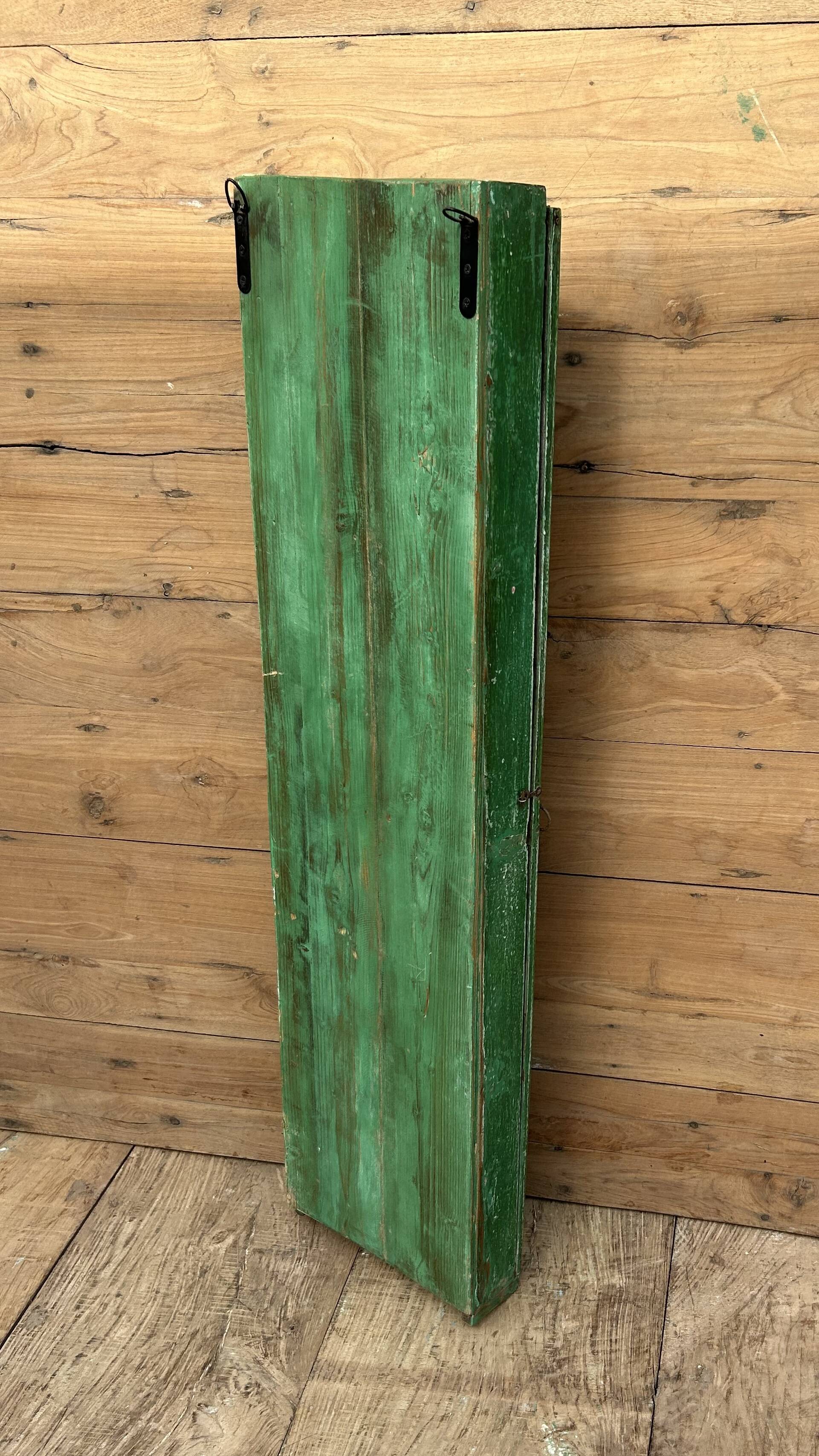 Wall display cabinet in Burmese teak with original patina.