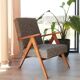 Vintage design armchair in mixed black fabric, walnut-coloured wood.