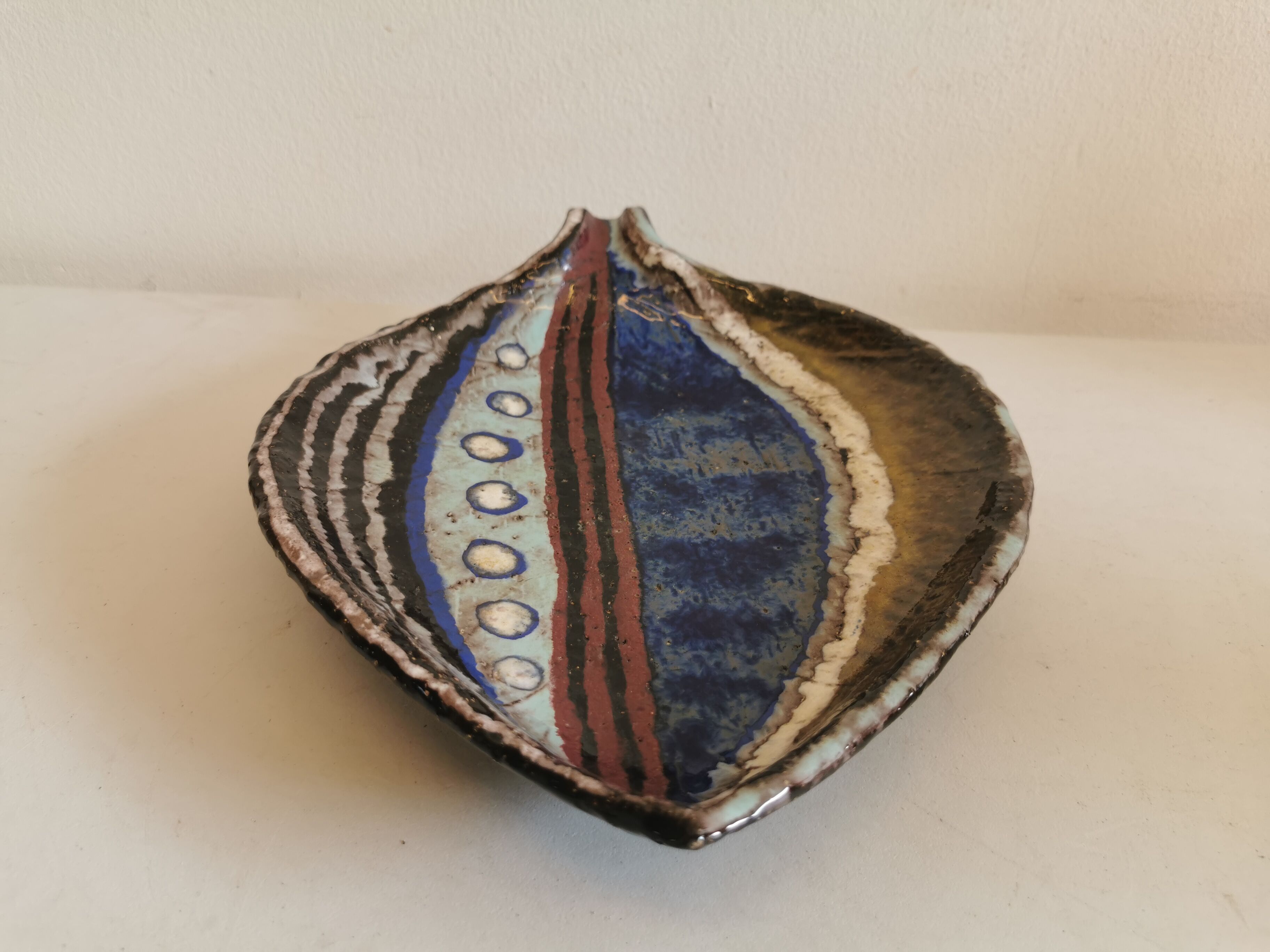 Danish ceramic dish shaped like a leaf.