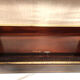 Varnished wood showcase and gold decoration in imitation of the so-called Boulle marquetry