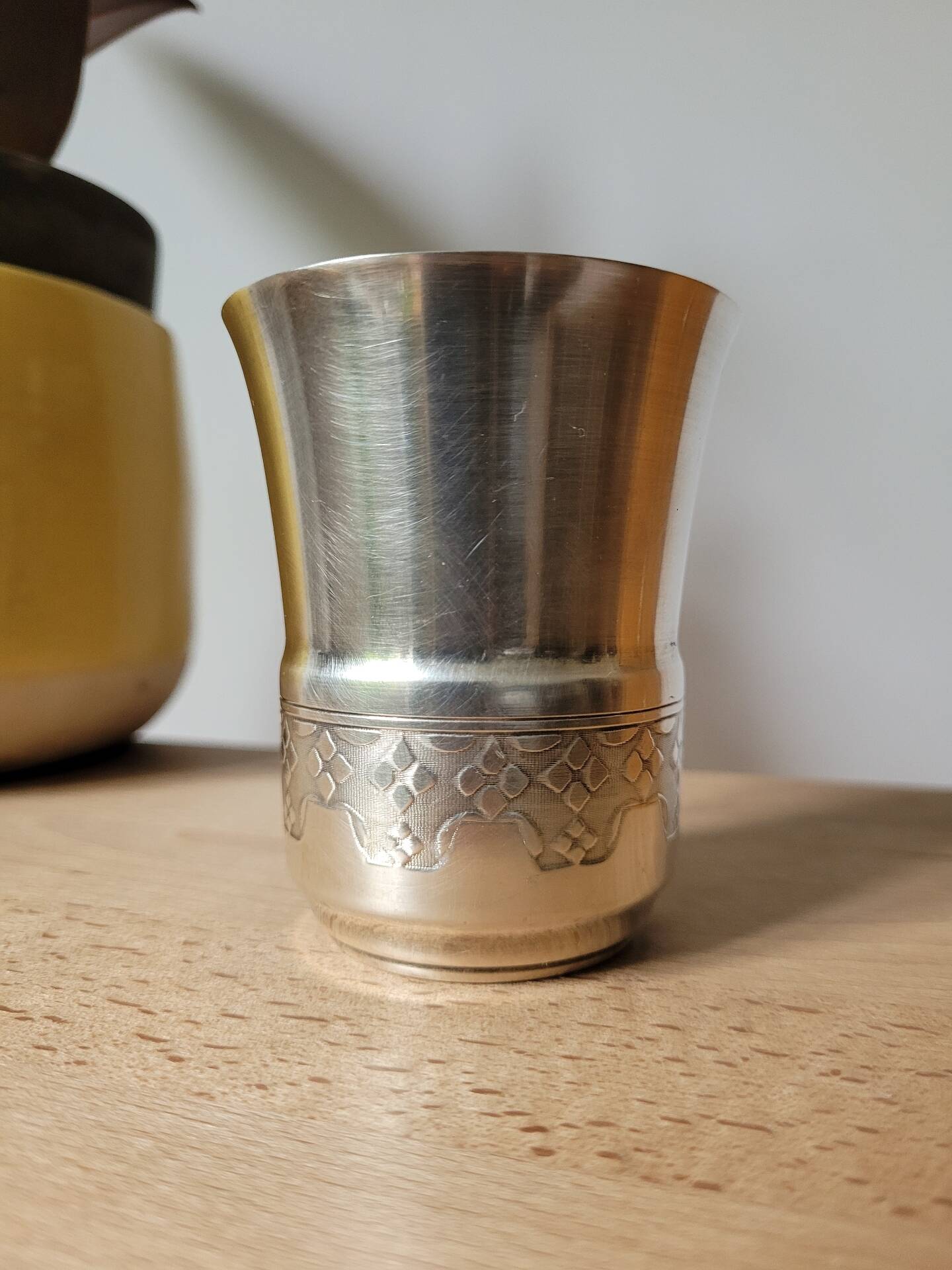 Silver tambourine with diamond pattern