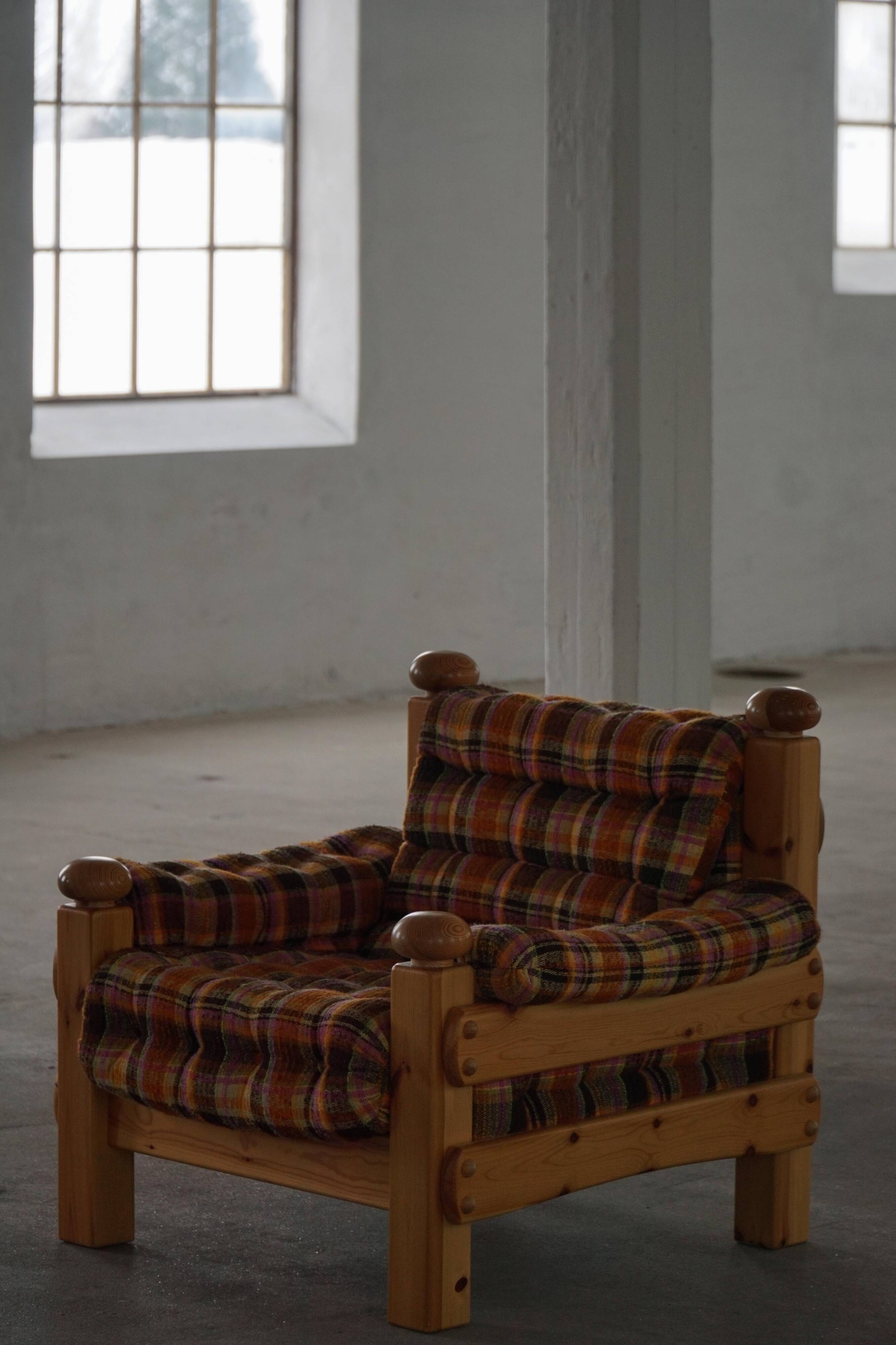 Brutalist lounge chair in solid pine, Swedish modern, made in the 1970s.