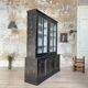 Display cabinet in patinated wood