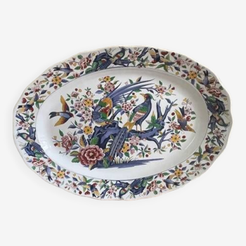 Very large oval ceramic dish, floral decoration with birds.