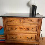 Antique wooden order with black marble top