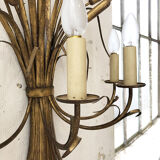 Gold metal reeds flowering wall light