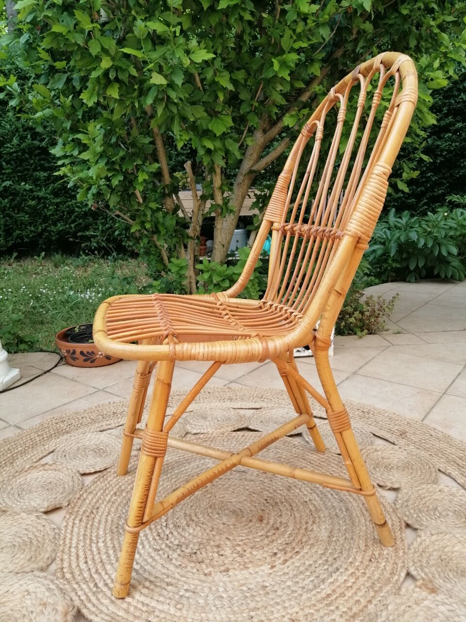 Series of 4 vintage rattan chairs.