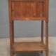 Curtained bedside table from the nineteenth century.