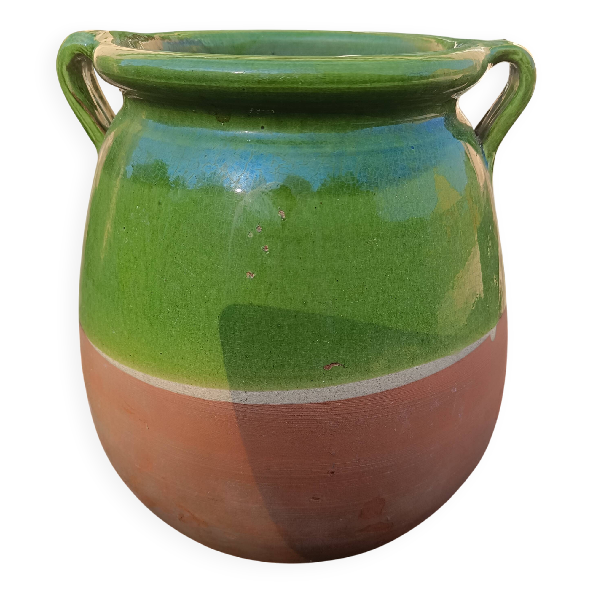 Mediterranean pot in green half-glazed terracotta.