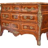 Tomb-shaped commode in Louis XV style with decoration featuring Spanish figures.