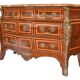 Tomb-shaped commode in Louis XV style with decoration featuring Spanish figures.