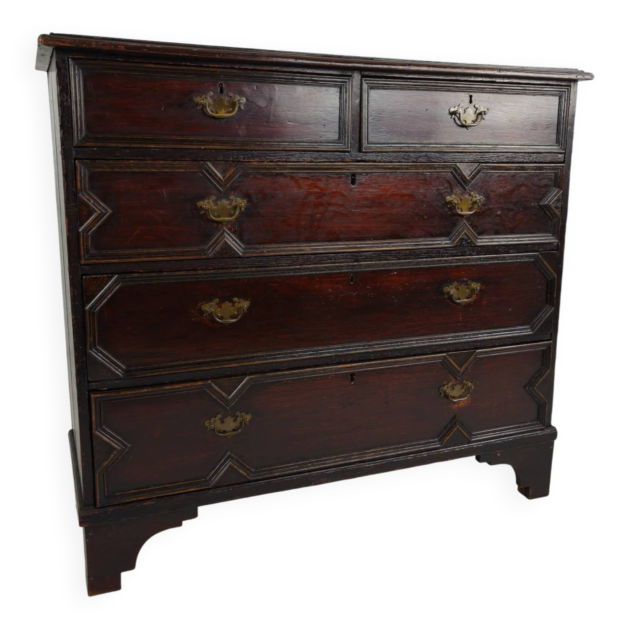 English geometric-panelled oak chest of drawers, circa 1680
