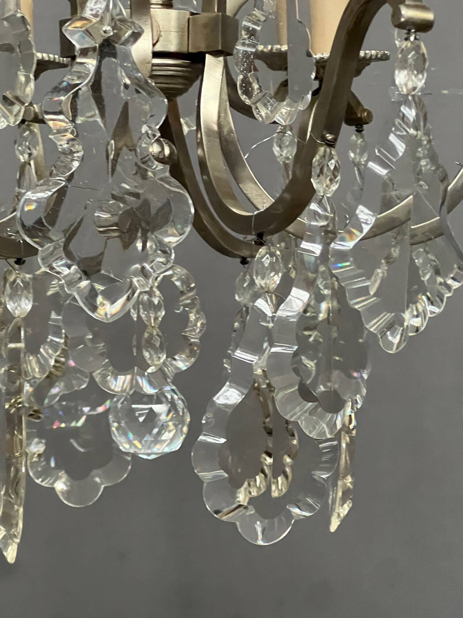 Rococo-style chandelier with 9 light arms.