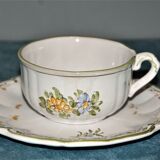 Two MOUSTIER cups decorated with flowers signed
