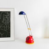 Blue-painted metal shade, chrome articulated arm desk lamp in Memphis-style 80s Pop Art with red base and yellow accents